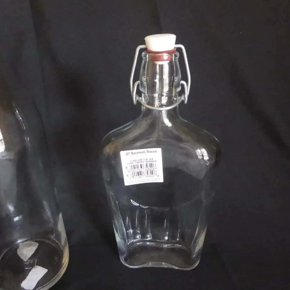 NEW 12.5” - 9.5” CRATE BARREL ITALY CLEAR GLASS AIR TIGHT LOCKING TOP 3 BOTTLES